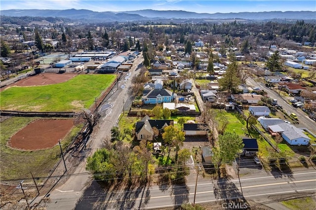 aerial view featuring a residential view and a mountain view