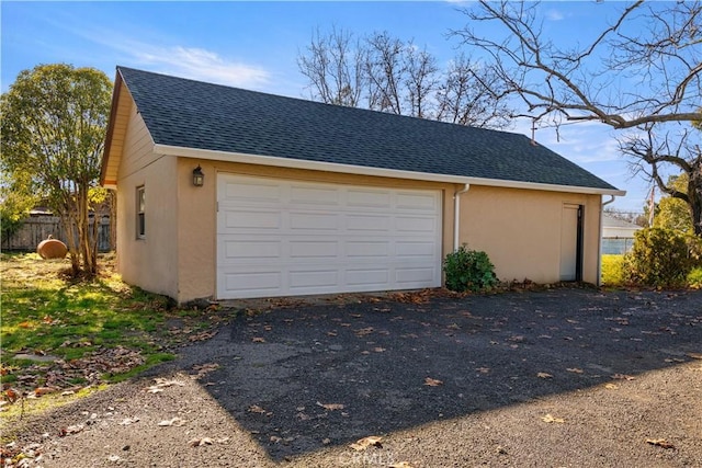 detached garage with fence