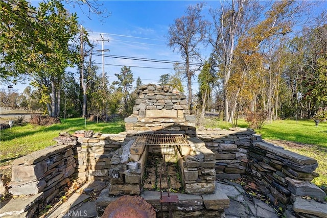 view of patio / terrace featuring a fireplace