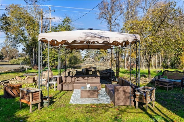 view of yard with a gazebo, outdoor lounge area, and a patio area