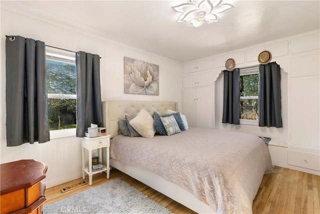 bedroom featuring light hardwood / wood-style floors