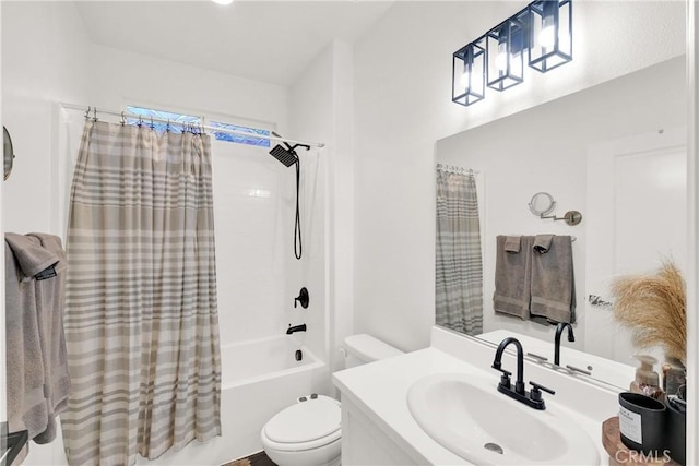 full bathroom featuring shower / tub combo with curtain, vanity, and toilet