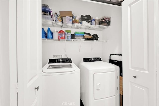 laundry area featuring washing machine and dryer