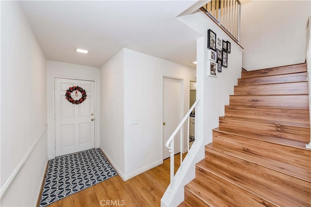 entrance foyer featuring hardwood / wood-style flooring