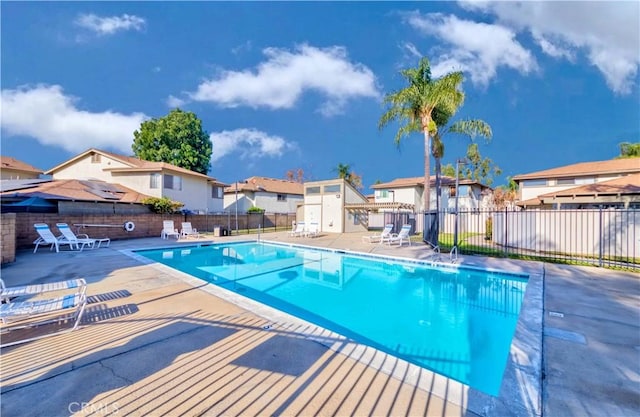 view of pool featuring a patio