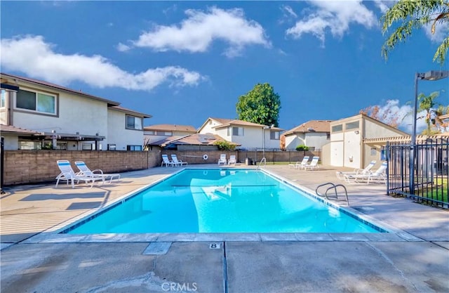 view of pool featuring a patio area