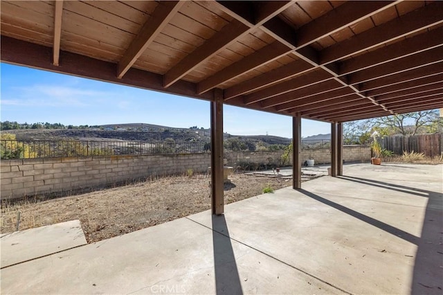 view of patio / terrace with a mountain view