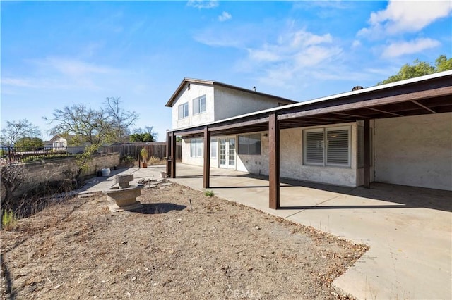 rear view of house featuring a patio