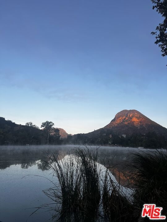 property view of water featuring a mountain view