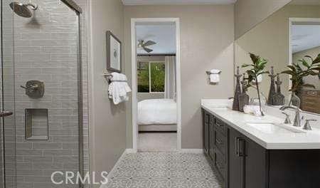 bathroom with tile patterned floors, walk in shower, and vanity