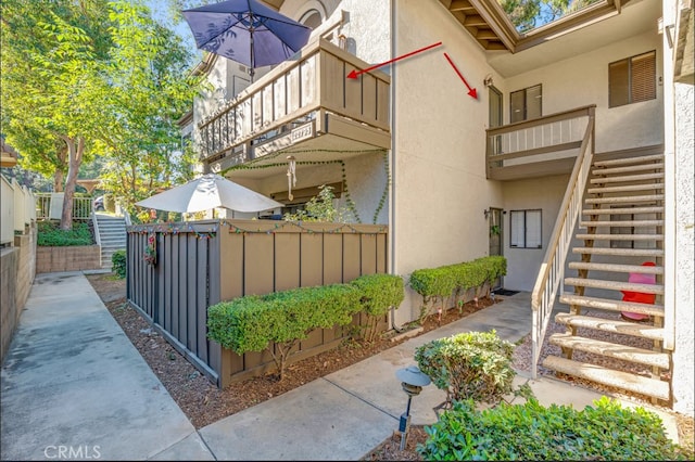 exterior space with a balcony