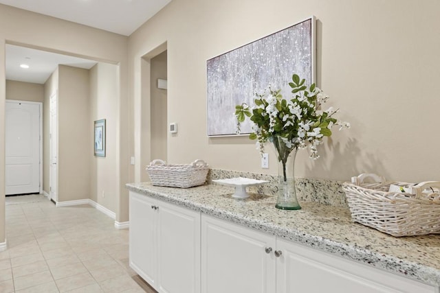 interior space with tile patterned floors and vanity