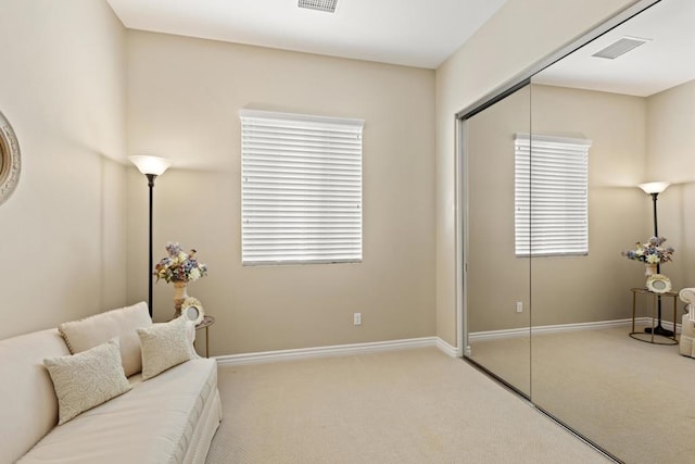 living area with carpet flooring