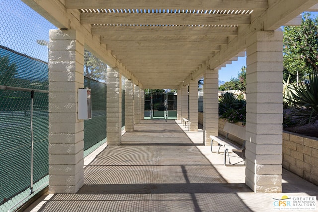 view of patio featuring a pergola