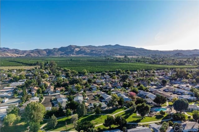 bird's eye view with a mountain view