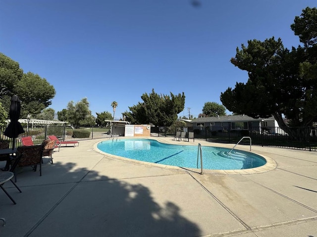 view of pool with a patio area