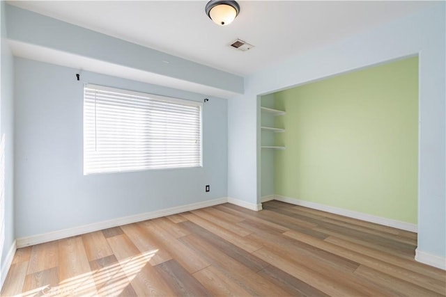 empty room featuring light hardwood / wood-style flooring