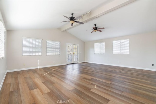 interior space featuring ceiling fan, a wealth of natural light, and hardwood / wood-style floors