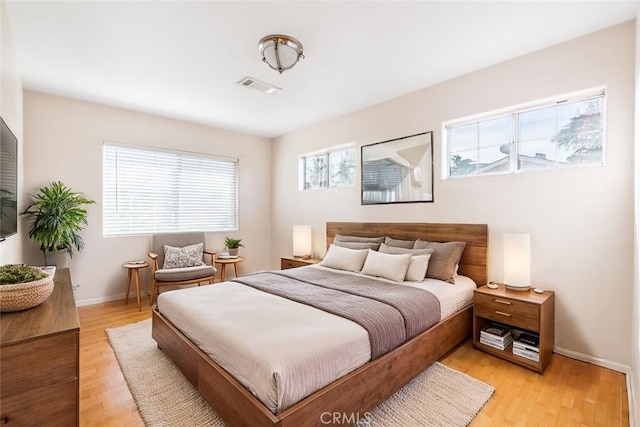 bedroom featuring light wood-type flooring