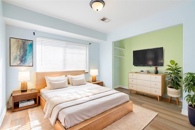 bedroom featuring light hardwood / wood-style floors