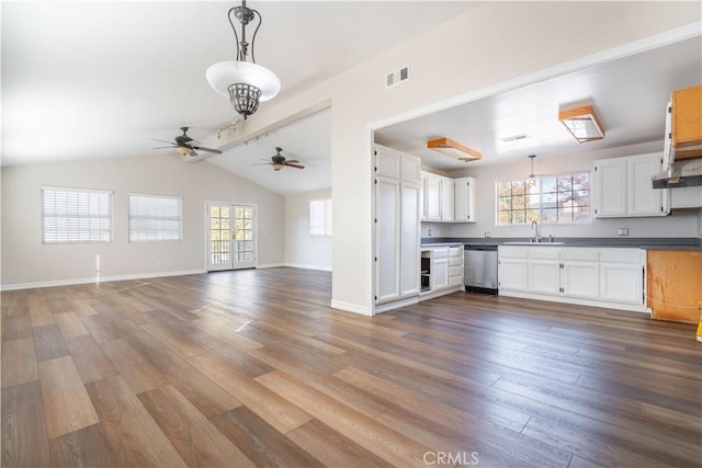 kitchen with ceiling fan, dishwasher, dark hardwood / wood-style floors, white cabinetry, and hanging light fixtures