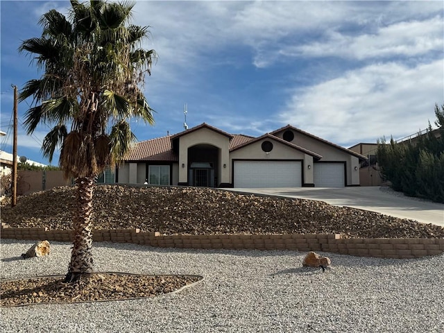 view of front of property with a garage