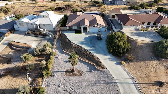 birds eye view of property with a residential view