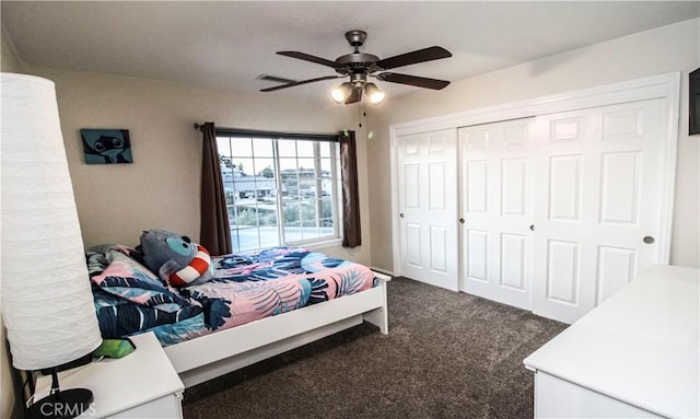 bedroom with a closet, carpet floors, and a ceiling fan