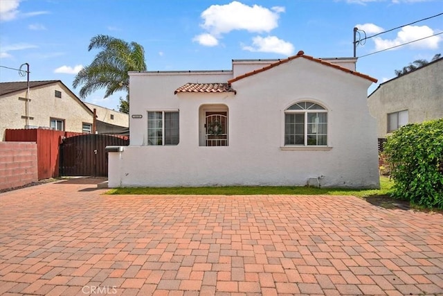 back of property with a patio area