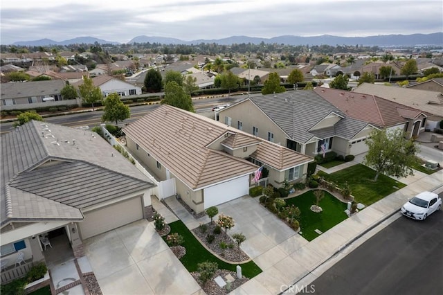 drone / aerial view featuring a mountain view