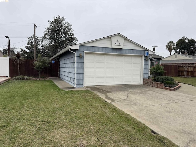 garage with a yard