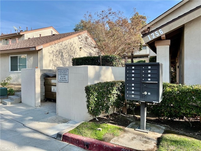 exterior details featuring a mail area