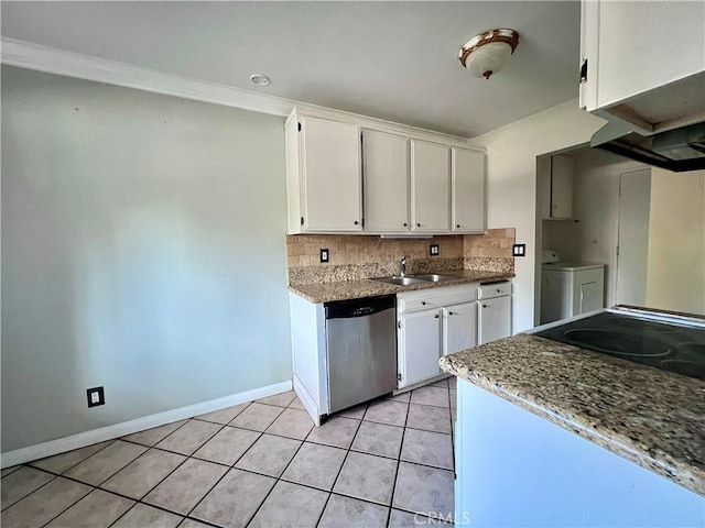 kitchen featuring stainless steel dishwasher, washing machine and dryer, sink, white cabinets, and light stone counters