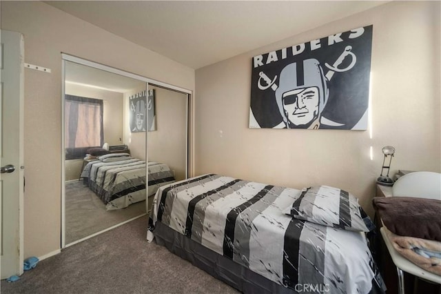 carpeted bedroom featuring a closet