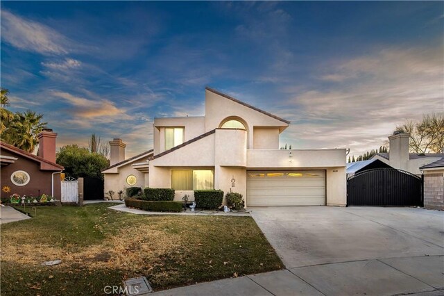 view of front of property with a lawn