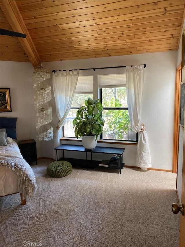 bedroom featuring carpet floors, lofted ceiling with beams, and wood ceiling