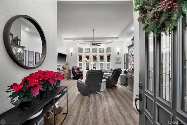 entryway featuring ceiling fan and light hardwood / wood-style floors