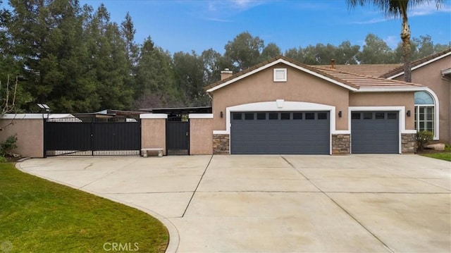 view of front of home featuring a garage