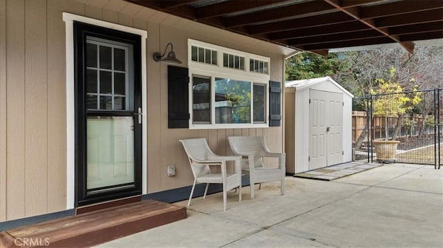 view of patio featuring a storage unit