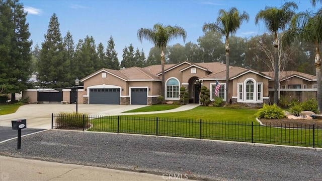 ranch-style home featuring a garage and a front yard