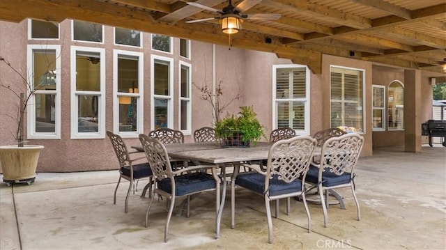 view of patio with ceiling fan