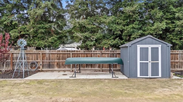 view of patio / terrace featuring a shed