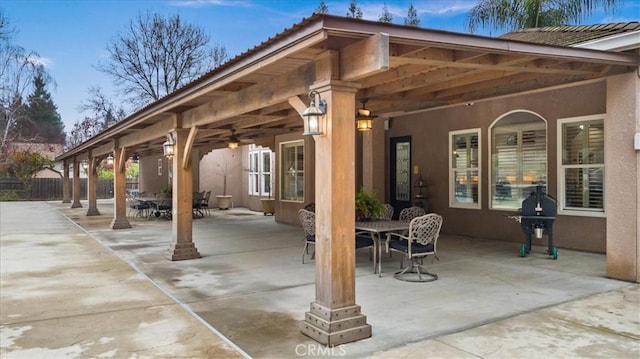 view of patio with ceiling fan