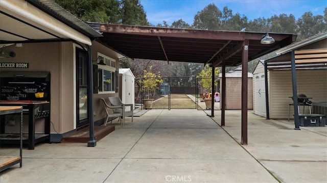 view of patio featuring a carport