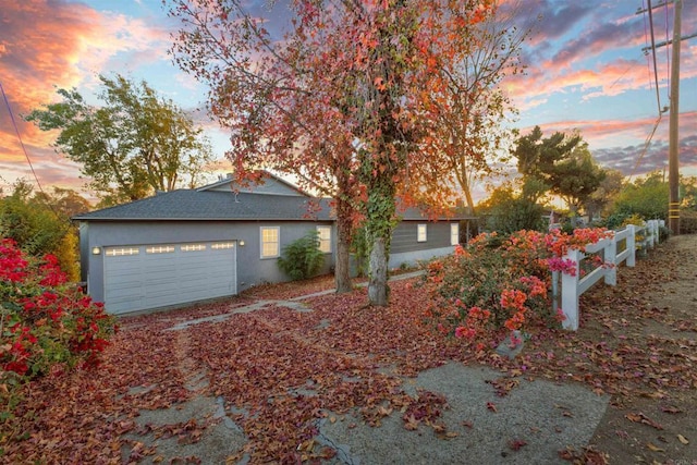 view of front of home with a garage