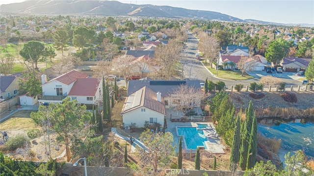 drone / aerial view featuring a mountain view