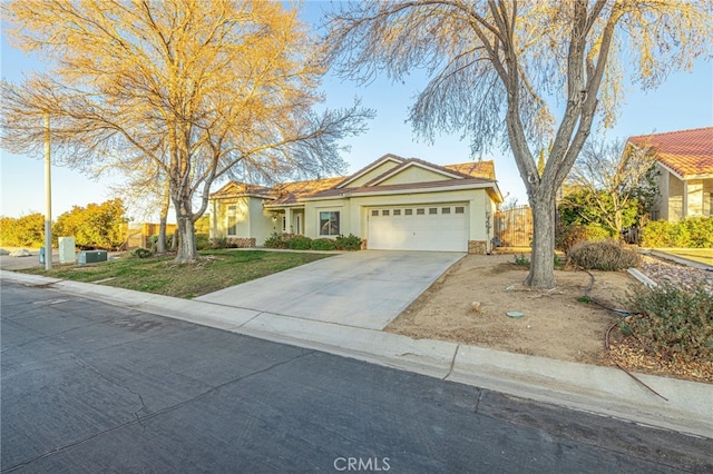 ranch-style house featuring a garage