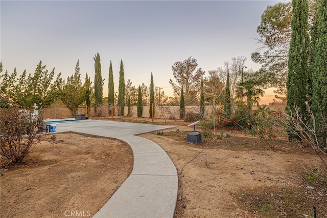 surrounding community with a patio