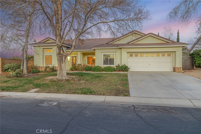 view of front of property featuring a garage