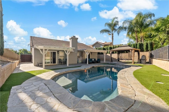 view of pool featuring a gazebo and a patio